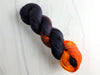 Embers -  Hand dyed variegated palindrome yarn - orange red black Halloween colors