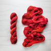 September - Hand dyed sock yarn - red orange burgundy