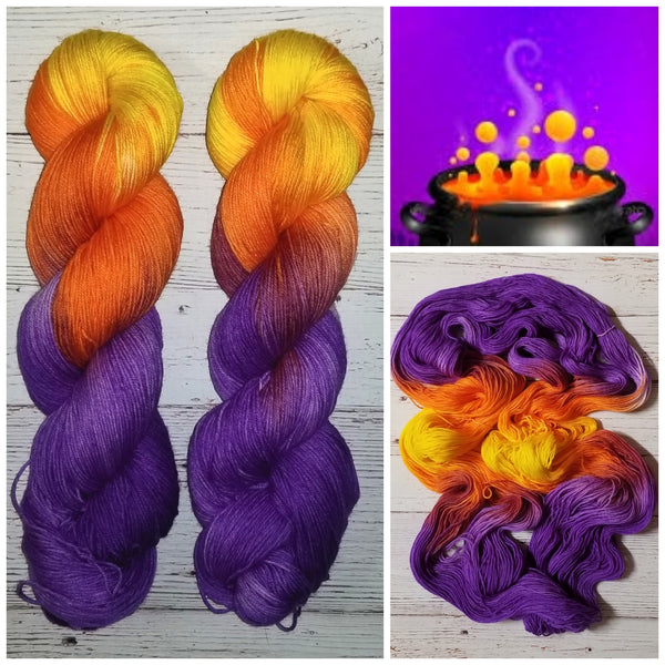 Hocus Pocus -  Hand dyed palindrome yarn - purple orange yellow Halloween sunset colors