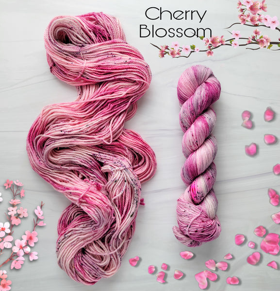 Cherry Blossom - Hand dyed variegated yarn - Merino Fingering to worsted light pastel pink with speckles