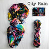 City Rain- Hand dyed yarn black rainbow speckled