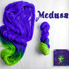 Medusa - Hand dyed assigned pooling yarn - blue violet and green glows under black light