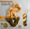 Pumpkin Seeds - Hand dyed yarn, Fingering Weight, assigned color pooling - white with orange speckles and a pop of green brown