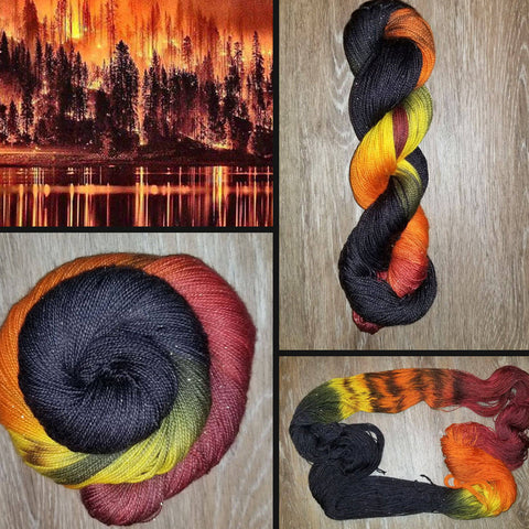 Out of the Ashes-  Hand dyed yarn black red orange yellow brown